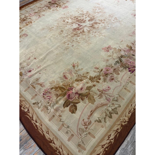 "This exquisite Antique Aubusson rug, dating to circa 1850, is a sophisticated example of mid-19th-century European...