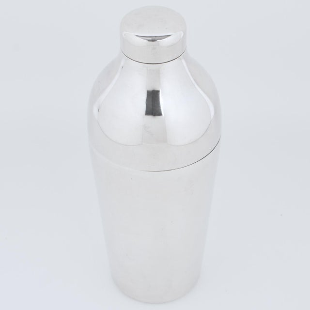 Renowned silversmith Sambonet crafted this elegant three-sectioned silver plate cocktail or Martini shaker in Italy in the...