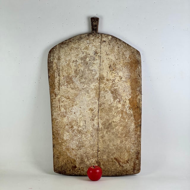 This is the first antique bread board we offer and we don't think we could have brought you a better option! A late 19th -...