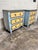 Fun pair of boho blue and yellow painted chests with brass accents. Likely made in India at some point. Not terribly old,...