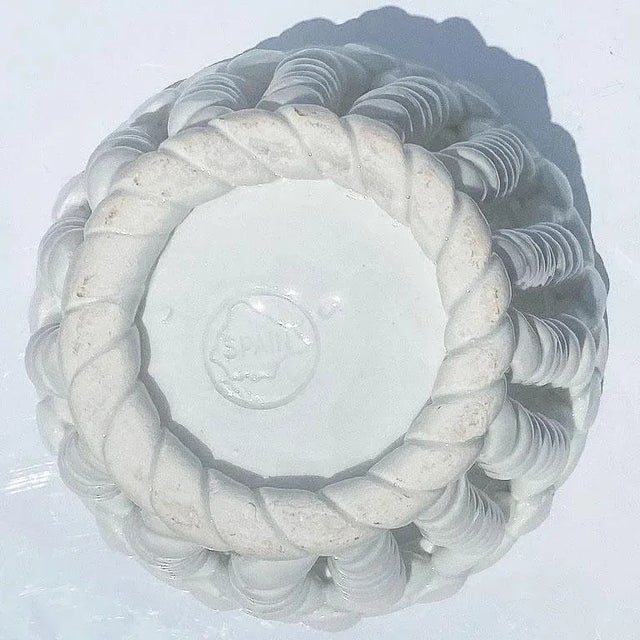 A lovely round white ceramic bread or fruit bowl from Spain. Created from ceramic, this Trompe L'Oeil basket is woven to...