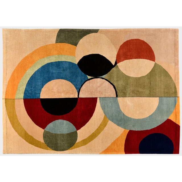 Hand-knotted in wool on a cotton foundation, this 6x9 vintage French rug draws inspiration from the pioneering work of...