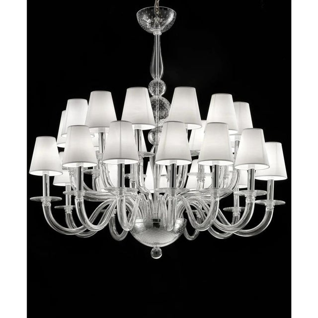 Contemporary luxury italian chandelier in Murano glass. Elegant chandelier in transparent glass made in Murano and chromed...