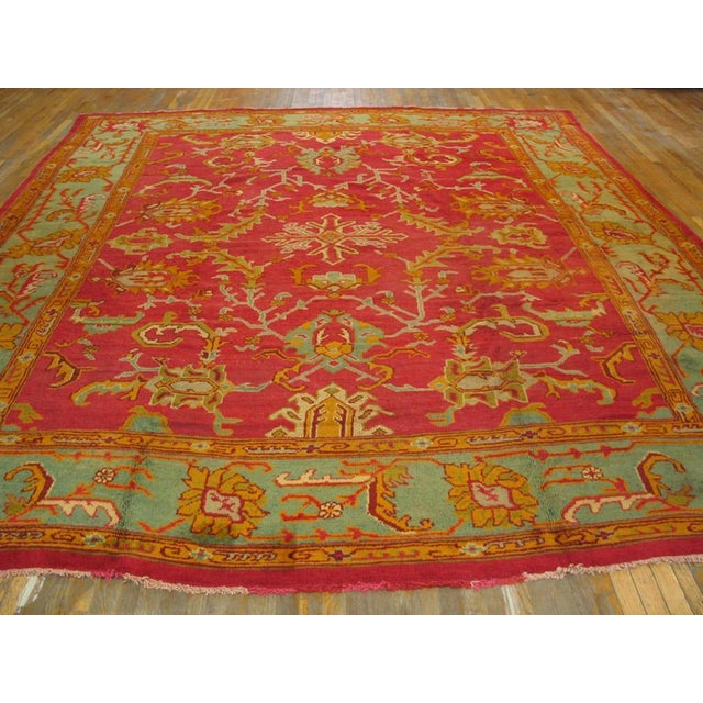 Introduce warmth and timeless character into your interior with this stunning Antique Turkish Oushak rug, hand-knotted in...