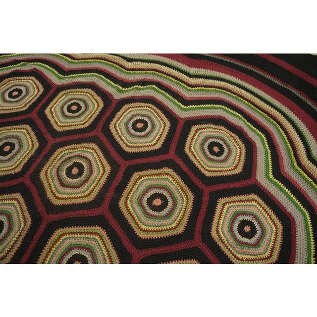 Antique Braided American Flat Weave Rug, Circa Date: 1930s. This exceptional American textile represents a sophisticated...