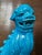 This is a pair of large turquoise glazed Foo Dog figurines. They are in a gorgeous ceramic with intricate designs around...