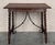 19th Spanish side table with cared Solomonic turned legs and iron stretcher. The top has a carved edges and a beautiful...