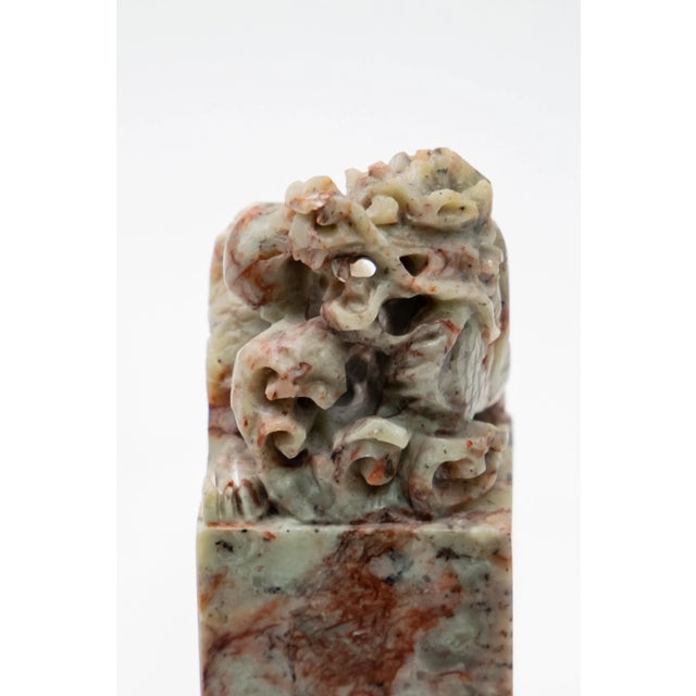 Offering this soapstone chop seal from China. Sitting on a tall square base that rises up. At the top it depicts a Dragon...