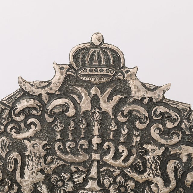This rare and exquisitely crafted 19th-century hand-worked repoussé oil lamp menorah from Poland reflects the rich...
