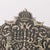 This rare and exquisitely crafted 19th-century hand-worked repoussé oil lamp menorah from Poland reflects the rich...
