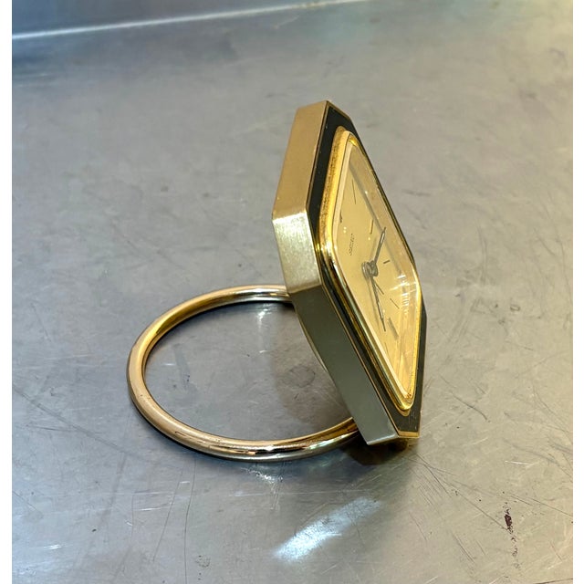 1990s Seiko postmodern gold/black folding travel clock. Has not been tested for function use--needs new battery. Excellent...