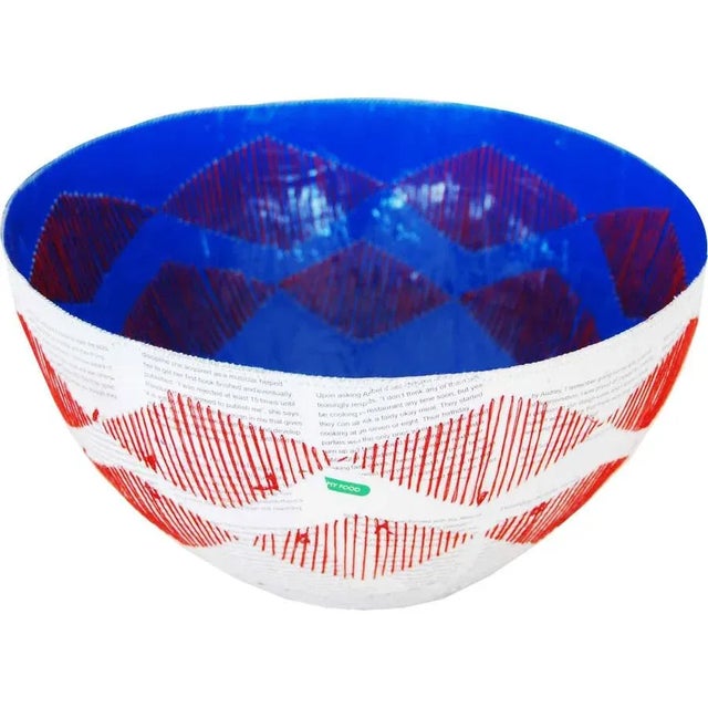 This 10" papier mache bowl was handcrafted in South Africa.