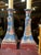 Up for consideration is a beautiful vintage pair of ceramic and wooden table lamps with tassel accents. These would look...
