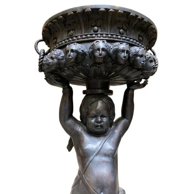 A gorgeous italian bronze italian cherub planter, 20th century. Perfect chubby putti. Great for the garden and of course...