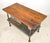 Early 20th century Industrial style heavy duty workbench with a solid wood tabletop, a galvanized steel drawer, lower...