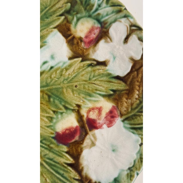 Antique French Majolica Strawberries and Flowers Plate- This Antique French Majolica plate features a beautiful design of...