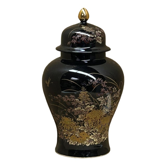 Oriental Black Glaze Porcelain Temple Jar Golden Flower Graphic For Sale