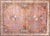 A simple but sophisticated vintage Persian Afghani Baluch rug with two large octagonal floral medallions in the center,...