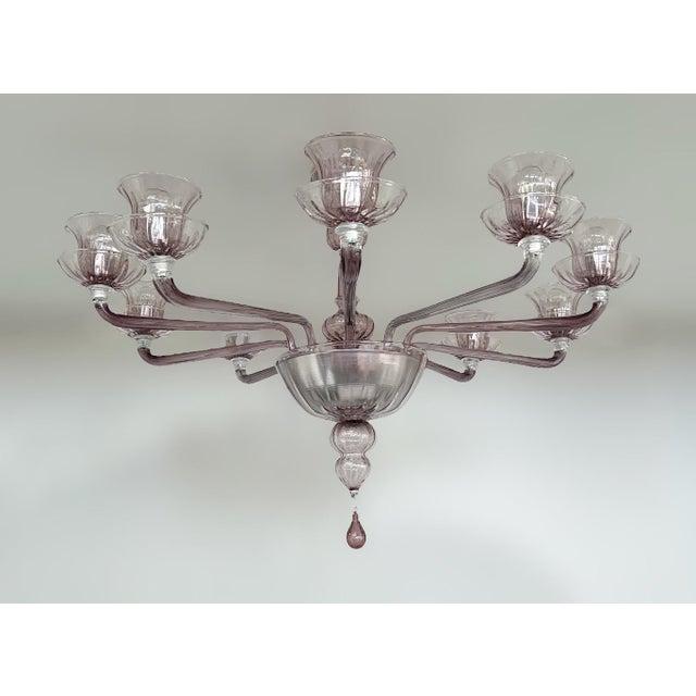 Italian 10-arm Venetian chandelier with amethyst Murano glass hand blown in "rigadin" technique to achieve the ribbed...