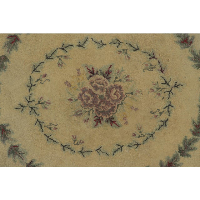 This 4x5 antique oval hooked rug is an exciting new addition to Rug & Kilim’s Antique collection—a romantic folk-art...