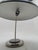 Steel sheet, canopy, lamp neck and lamp base chrome-plated, the large disc is the switch This piece has an attribution...