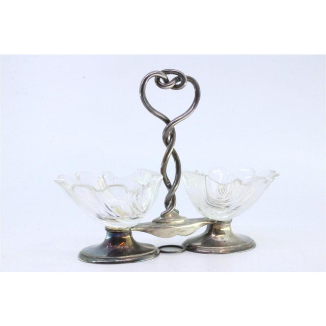 Shell-Shaped Glass and Silver Salt and Pepper Shakers, Set of 3, in Very Good conditions. Designed before 1890 This piece...