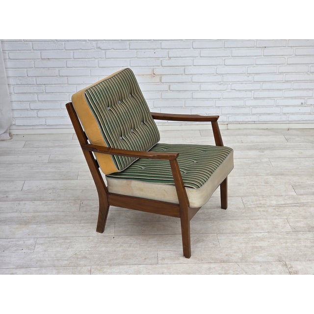 1960s, Danish armchair. Original striped green furniture wool, honey yellow furniture wool, plastic gray buttons. Beech...