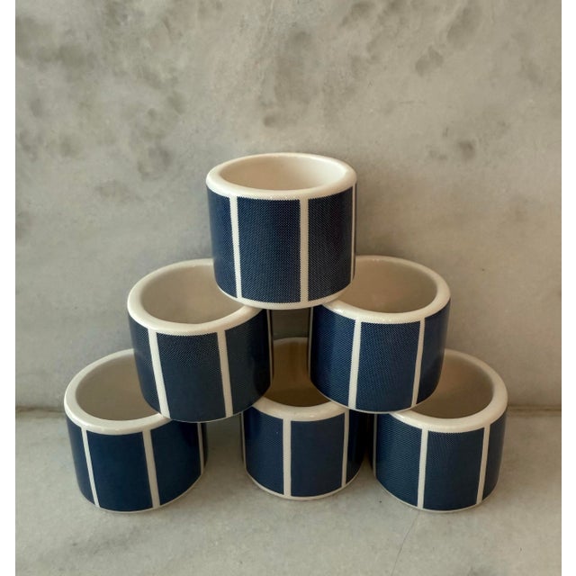Set of 6 ceramic blue and white napkin rings by Audrey and made in Taiwan. Set retains original makers sticker.