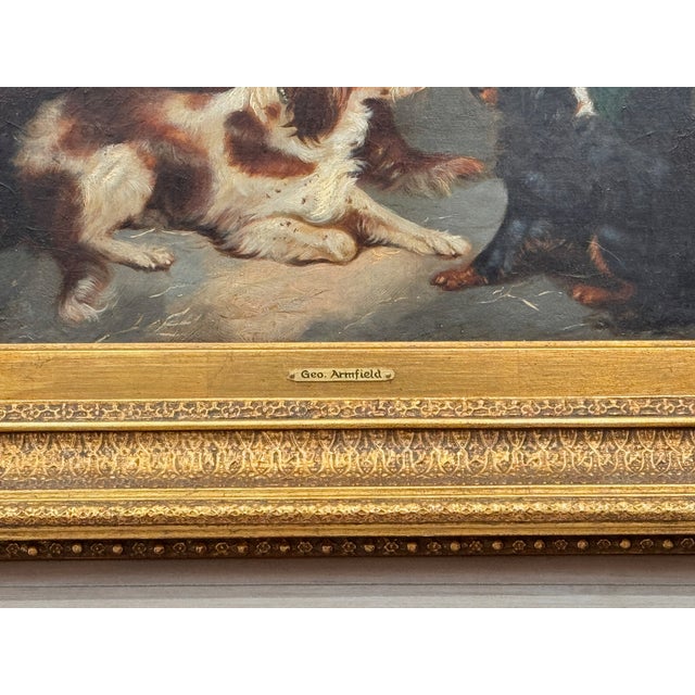 Oil on canvas depicting two gun dogs — a spaniel and a darker hound — resting after the hunt. The paint surface shows...