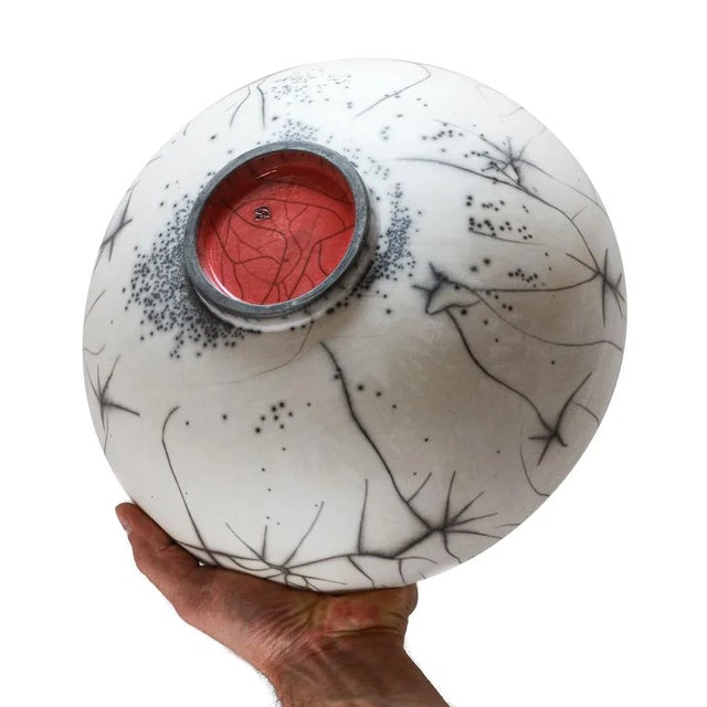 Bowl L is made of ceramic with the use of the Naked Raku and Raku technique. The Bowl is created entirely by hand and is...