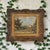 A country road curves toward a cluster of farm buildings beneath an expansive, cloud-filled sky in this signed oil on...