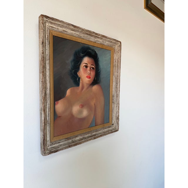 Striking 1960s vintage oil painting featuring a sensual female nude portrait rendered in a soft, realistic style. The...