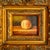 Vintage miniature still life oil on board painting capturing a single luminous peach set against a deep moody backdrop....