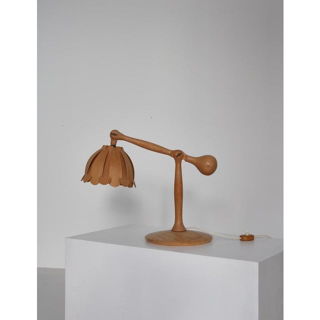 Wonderful Scandinavian Modern table lamp handmade in Sweden in the 1960s. The lamp is skillfully constructed from light...