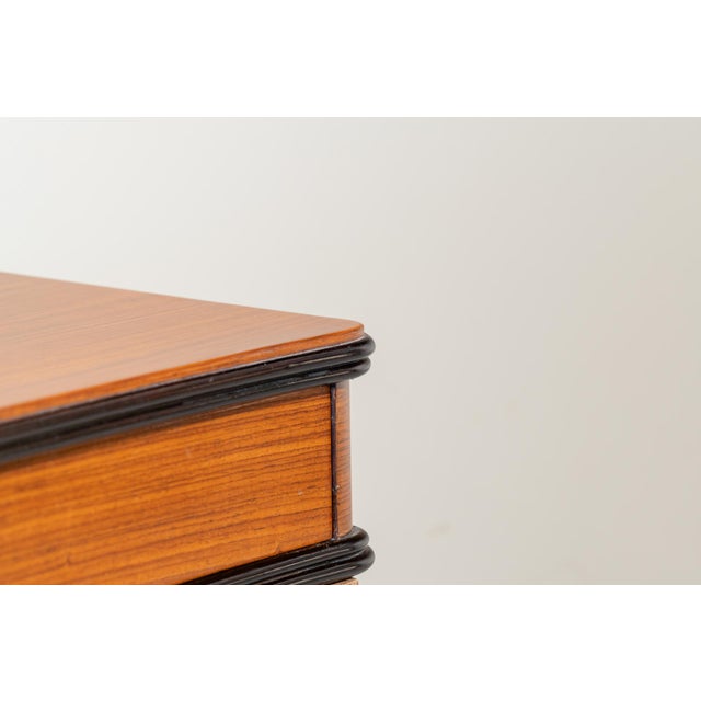 Pair of bedside tables made of zebrawood with a single drawer each, designed to be wall-mounted. Rounded corners and...