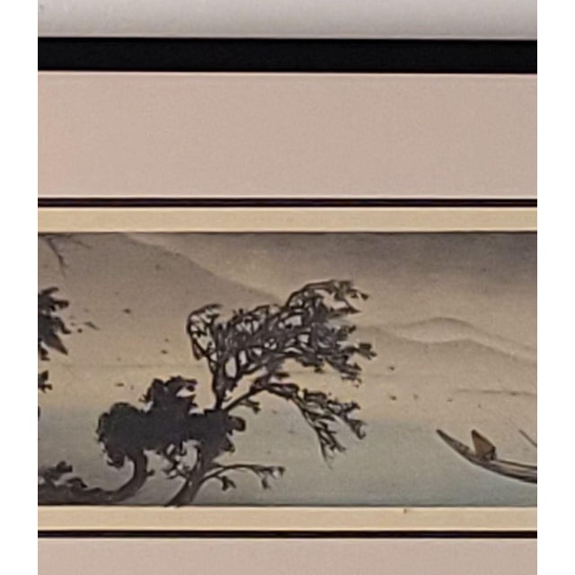 An unusual small woodblock of a misty scene with a boat, circa 1920.