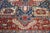 This majestic NW Persian village carpet shows a madder field supporting a powerful navy octogramme medallion with four...