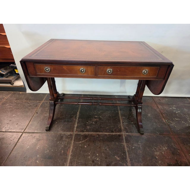 A wonderful useful table for behind sofa, along hall, for a desk workspace and more. Real leather top with just the right...