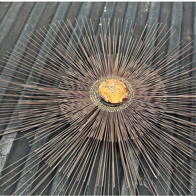 I love this so much and hurts me to sell. A truly exceptional and rare find — this stunning 41-inch starburst wall...