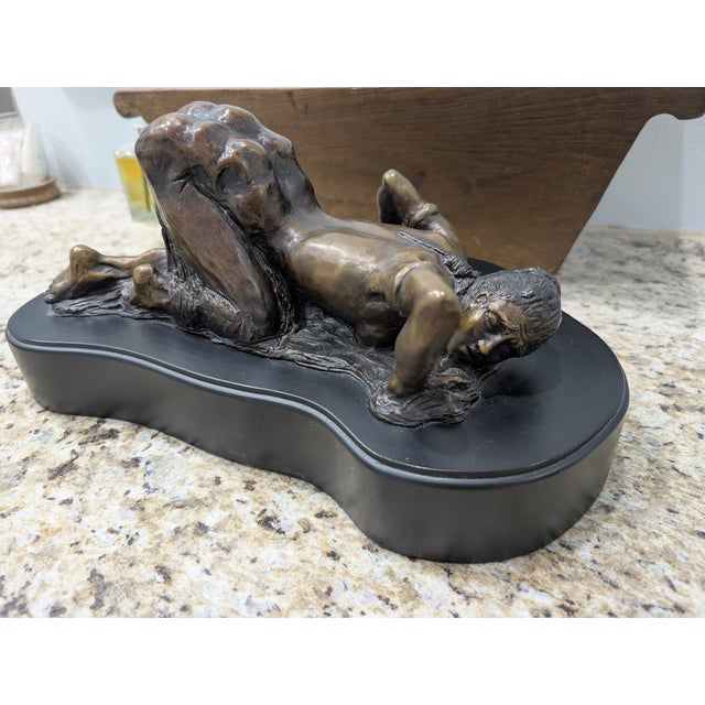 Bronze. Size (in): 7H x 9W x 15" L with custom-handcrafted black wood base. Lost-wax method cast bronze, signed by...