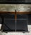 Equally at home beside a fireplace or sofa, this vintage blackened iron carrier offers stylish storage for firewood,...