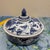 Add a touch of timeless elegance to your home with this beautiful blue and white porcelain lidded bowl. Featuring a...