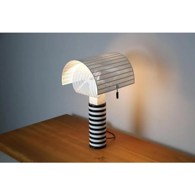 Vintage Table Lamp by Mario Botta for Artemide, 1986, in Very Good conditions. Designed 1980 to 1989 This piece has an...