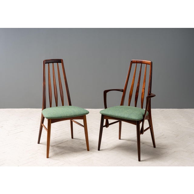 Denmark, ca. 1960s. A set of eight rosewood Eva dining chairs by Niels Koefoed for Koefoeds Hornslet. Each features a...