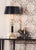 Illuminate your study with this traditional hand finished cast brass candlestick lamp. This classic table lamp features...