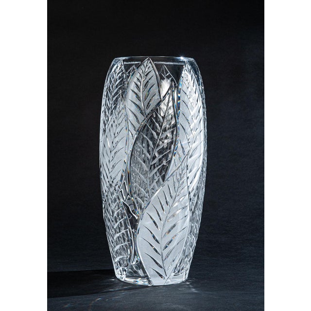 Handcrafted in Italy, this tall cylindrical vase is made from brilliant clear crystal and hand cut with an elegant layered...