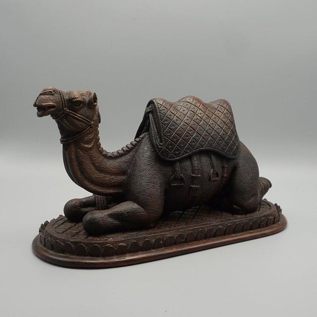An excellent late 19th century hardwood carving of a recumbent camel. Dimensions: H 14cm W 26cm D 11.5cm Origin: Indian...
