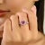 Celebrate love and sparkle with this dazzling heart-shaped ring, crafted in polished sterling silver. A vibrant pink cubic...