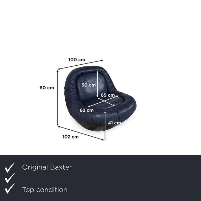 This Baxter Barett armchair makes a real statement in your living room, its organic, almost floating form instantly...