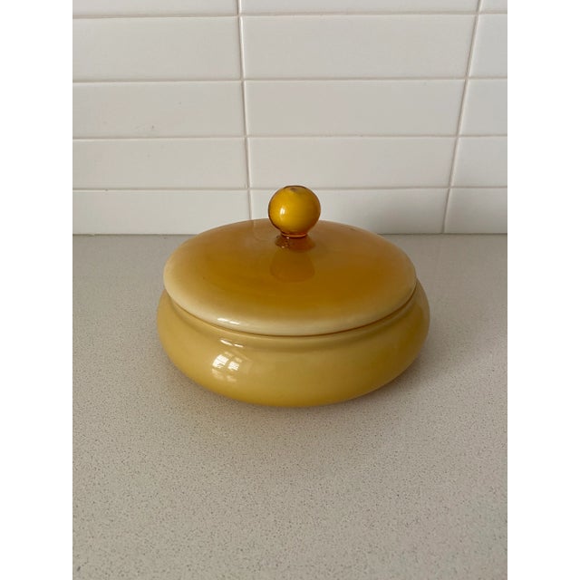Classic mid-century hand-blown cased glass urn in a deep amber color. Fill it with treats or showcase on a tabletop as is...